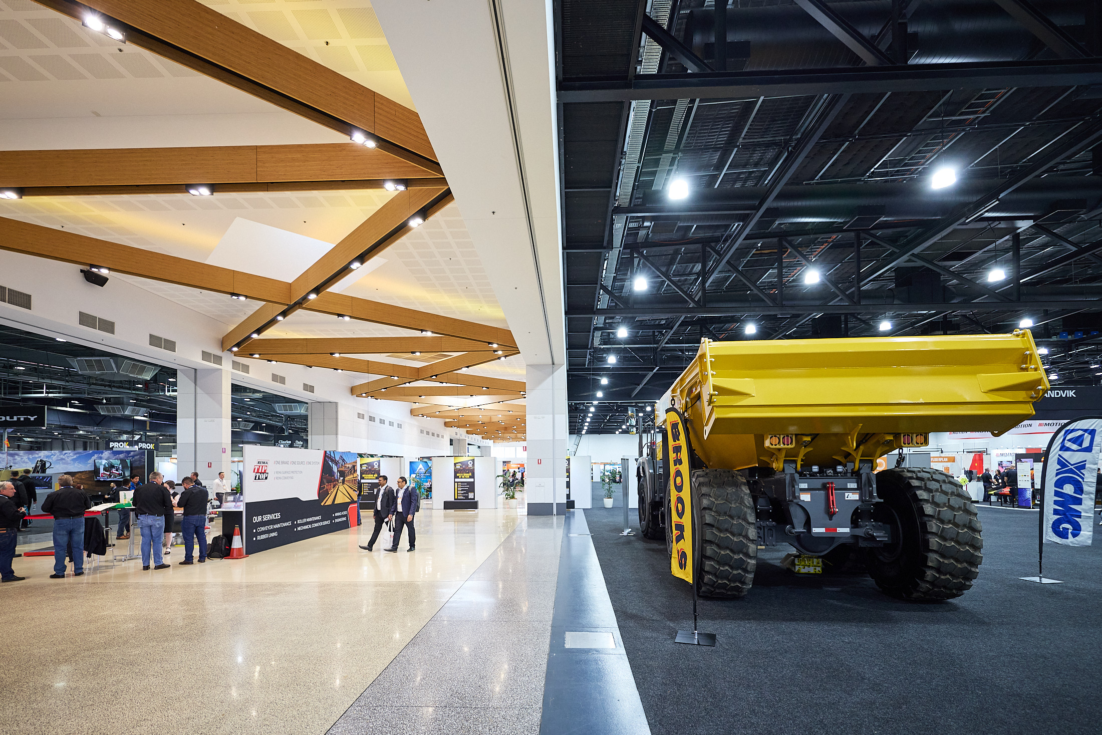 Bluestone 8090 Tile with Earthmoving Equipment Stored On It - Exhibit Modular Flooring